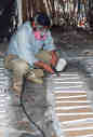 John painting the cribbage boards